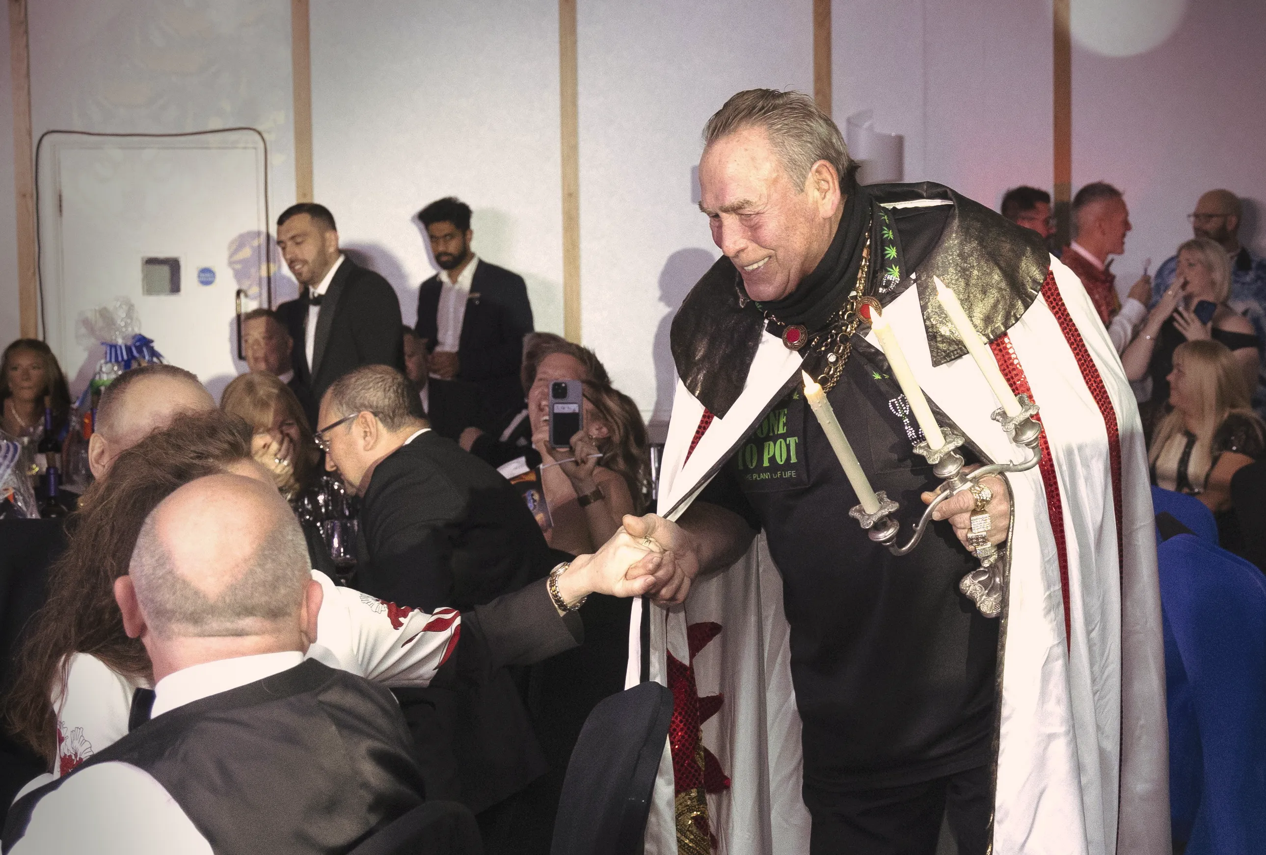 Darts legend Bobby George greeting the crowds